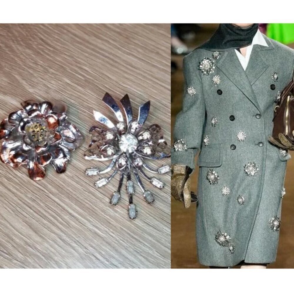 Bundle 2 silver tone star burst flower brooches, create your own runway look.